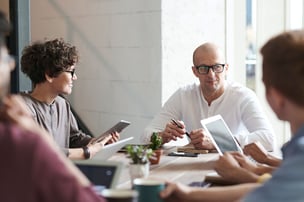 Man_woman_table_meeting-1